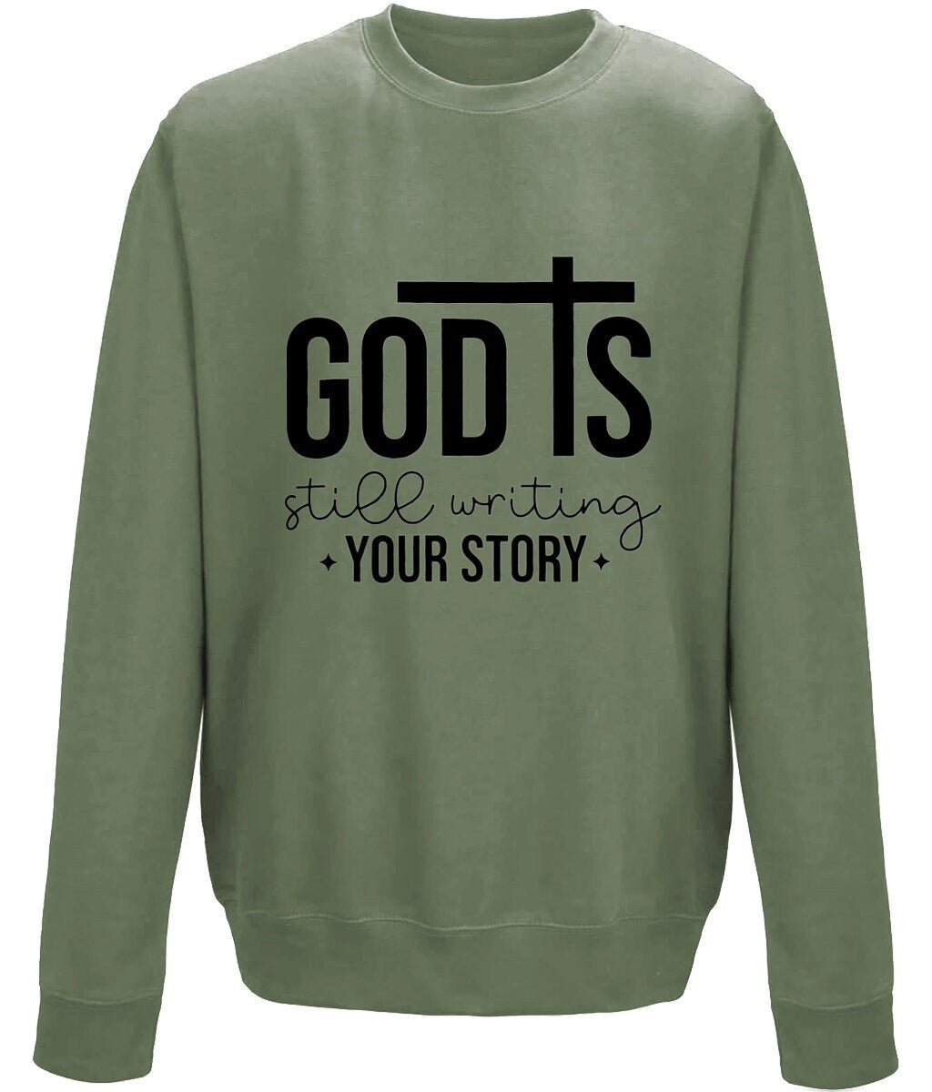 God Is Still Writing Your Story unisex sweatshirt - BoundlessLoveStore - X-Small - Earthy Green - Christian Sweatshirt