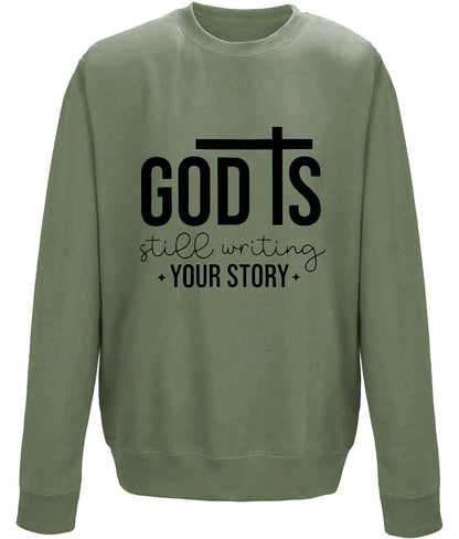 God Is Still Writing Your Story unisex sweatshirt - BoundlessLoveStore - X-Small - Earthy Green - Christian Sweatshirt